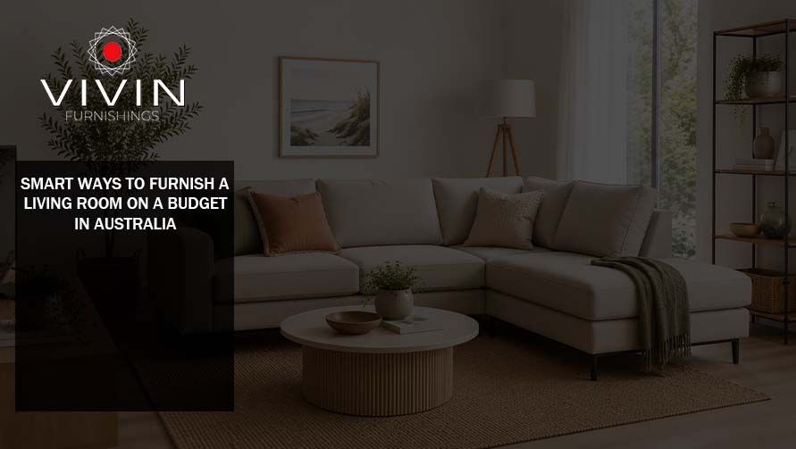 Neutral living room furnished with an affordable sofa, coffee table and simple décor