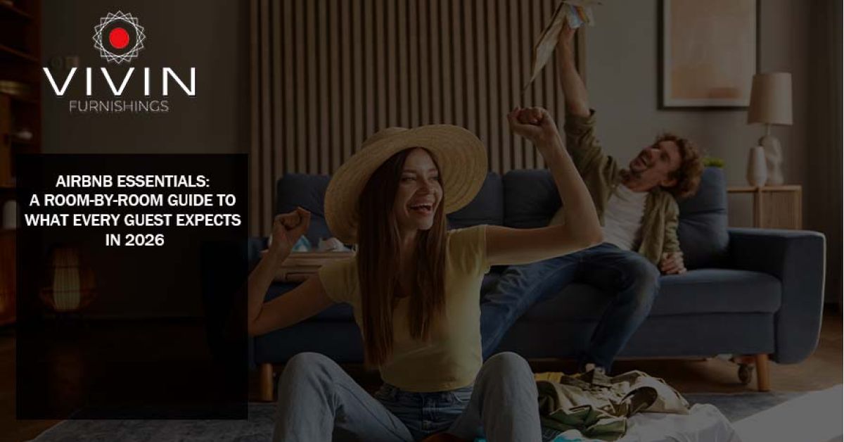 happy couple relaxing in a stylish living room representing ideal airbnb guest experience