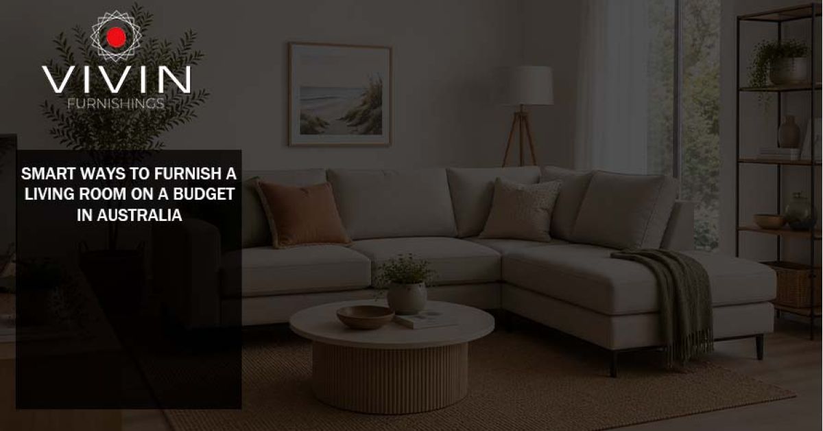 Neutral living room furnished with an affordable sofa, coffee table and simple décor