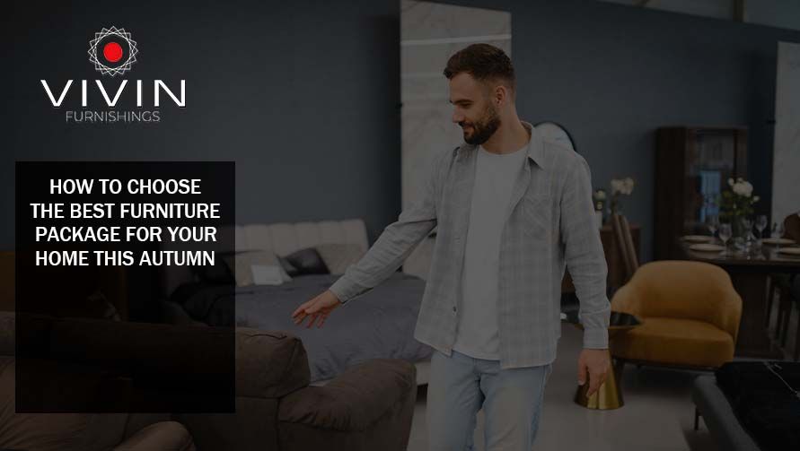 Man selecting a sofa in a modern furniture showroom, illustrating how to choose the best furniture package for a home in autumn